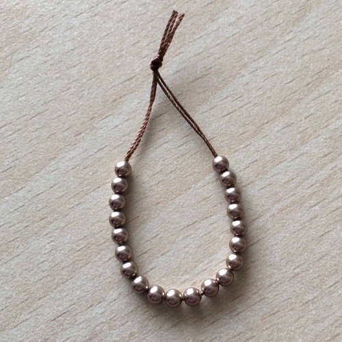 Sachet de perles de swarovski  couleur bronze