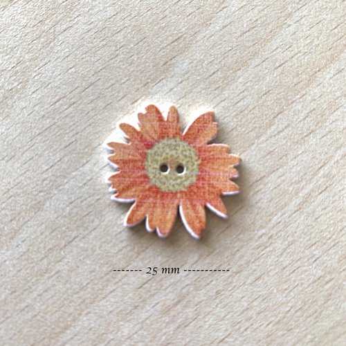 Joli petit bouton "marguerite " orange taille:  25 mm 
