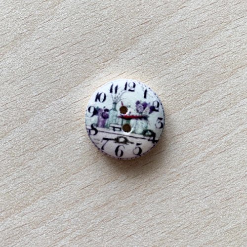 Joli petit bouton "pendule " 12  taille:  20 mm 