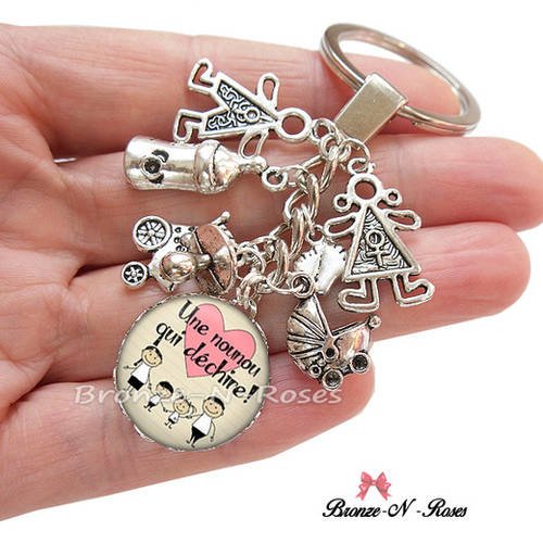Porte clés " merci nounou " cabochon métal argenté breloque cadeau pour la nourrice verre rose 
