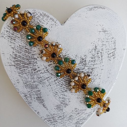 Bracelet eventail couleur vert et or.