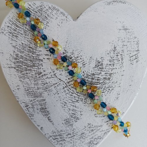 Bracelet zigzag, coloris bleu et jaune en perles de verre.