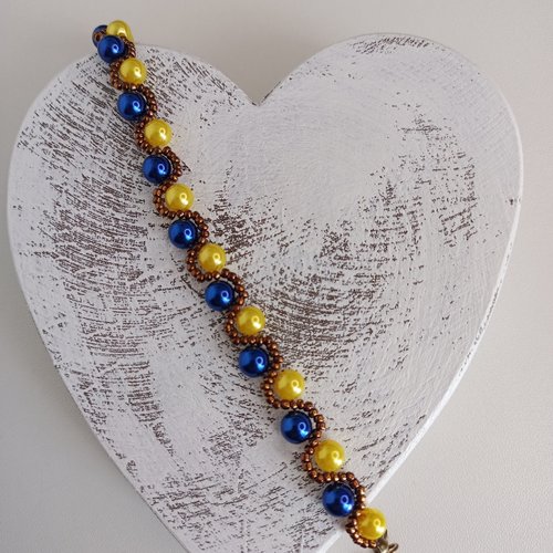 Bracelet wavy acrylique coloris bleu et jaune.