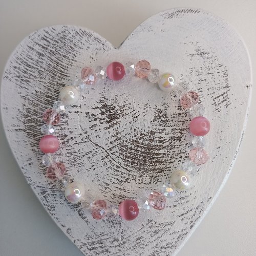Bracelet élastique en perles, coloris rose et transparent. taille 18cm