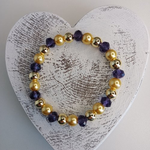 Bracelet élastique en perles, coloris violet et doré. taille 18cm