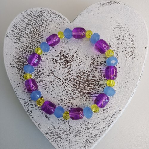 Bracelet élastique en perles, coloris violet et jaune. taille 17cm.