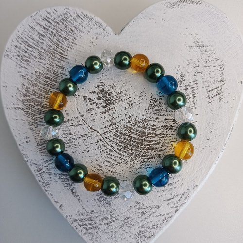 Bracelet élastique en perles, coloris vert et ocre transparent. taille 16cm.