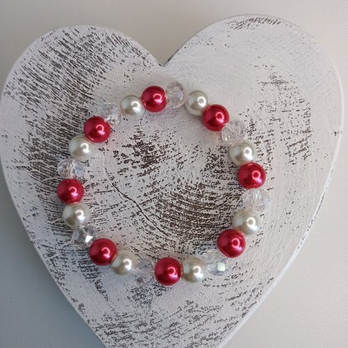 Bracelet élastique en perles, coloris rouge et blanc. taille 16cm.
