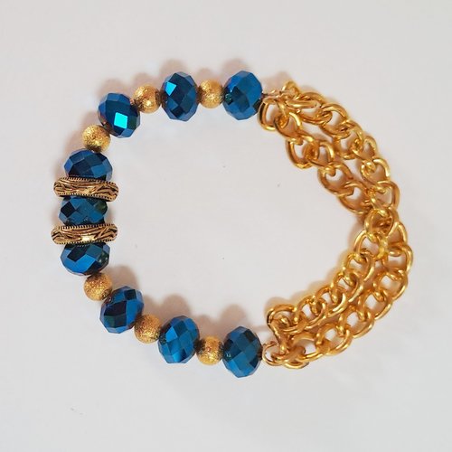 Bracelet chaines or et pierres bleu
