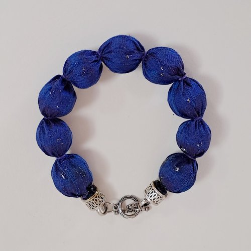 Bracelet boules bleu vif tissu