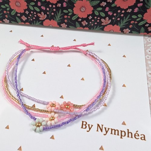 Bracelet lila 4 rangs avec fleur tissée main
