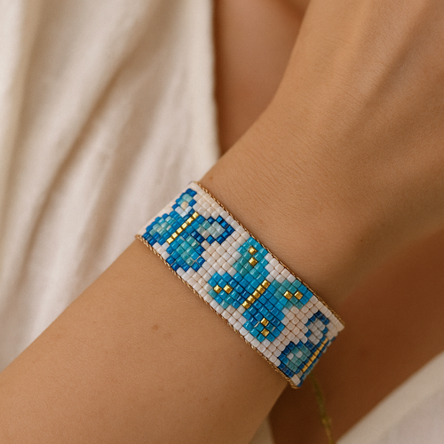 Bracelet manchette papillon bleu tissé main perles