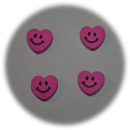 Lot de 4 perles en bois fuchsia en forme de cœur souriant