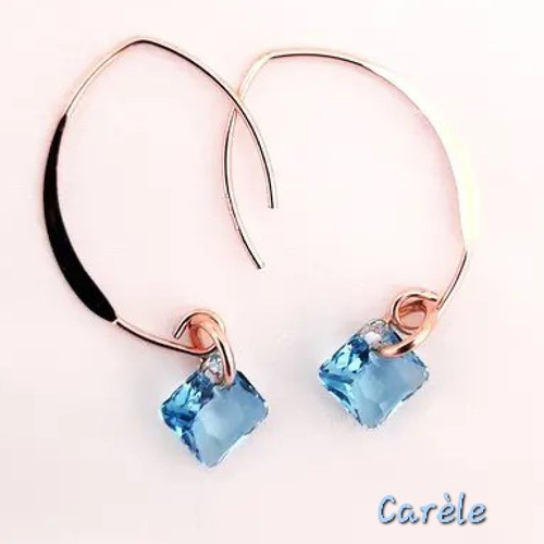 Boucles d'oreilles or laminé rose et cristal swarovski bleu