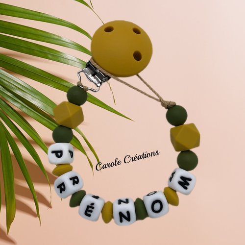 Attache tétine personnalisé en silicone, modèle forme hexagone colorie jaune moutarde et vert kaki foncé