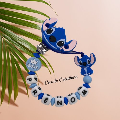 Attache tétine personnalisée en silicone, modèle garçon stitch avec perle boss, coloris bleu moyen et bleu foncé