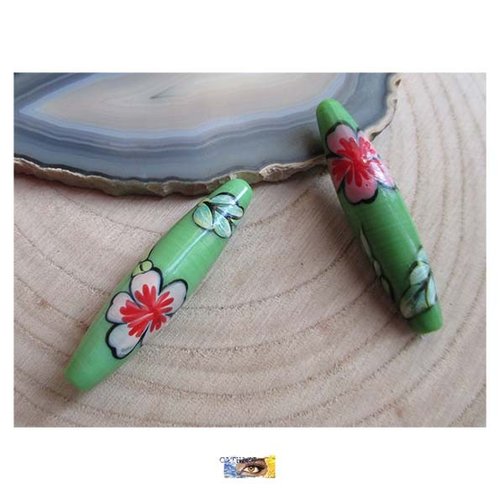 1 perle céramique motifs fleurs sur fond vert anis