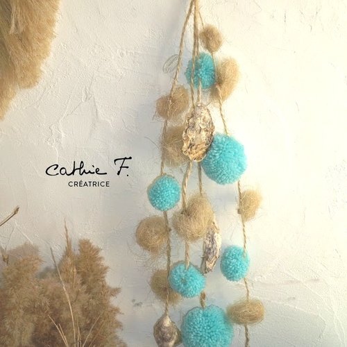 Guirlande pompons coquillages turquoise