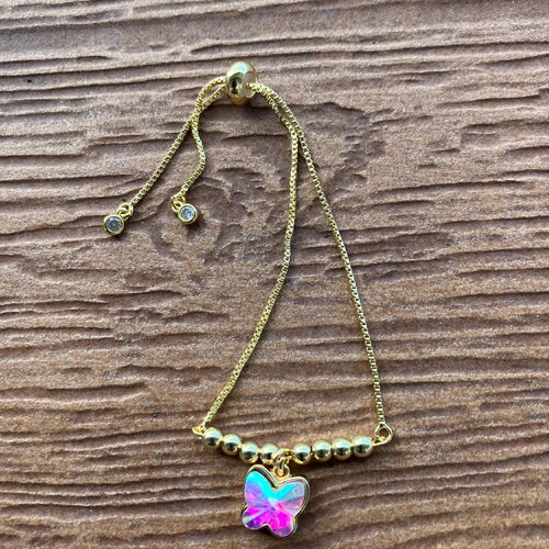 Bracelet moderne chaîne coulissante en plaqué or et cristal ab aux multiples reflets