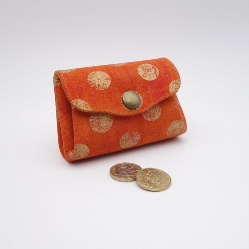 Porte-monnaie compact à 3 compartiments, pois dorés sur fond orange
