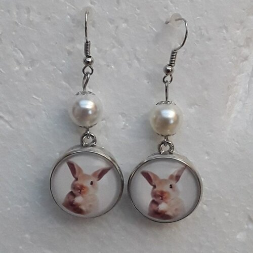 Boucles d oreilles , crochets , lapins ,  boutons,  pressions, verres , perles , blanches