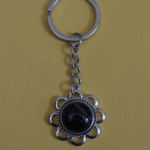 Porte clés rond avec perle noire 