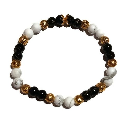 Bracelet en perles noires, blanches et dorées