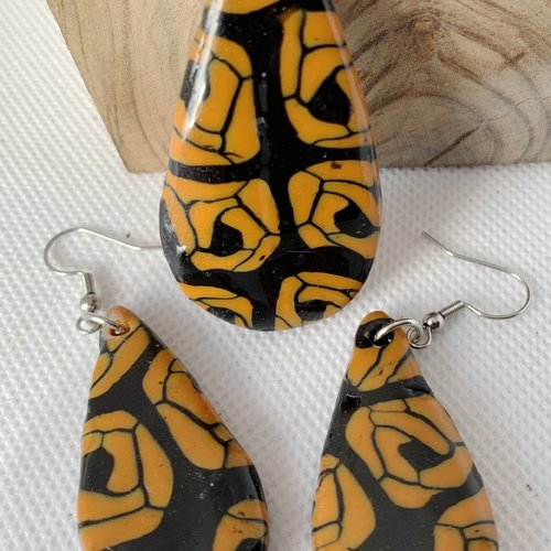 Parure en argile polymere et resine