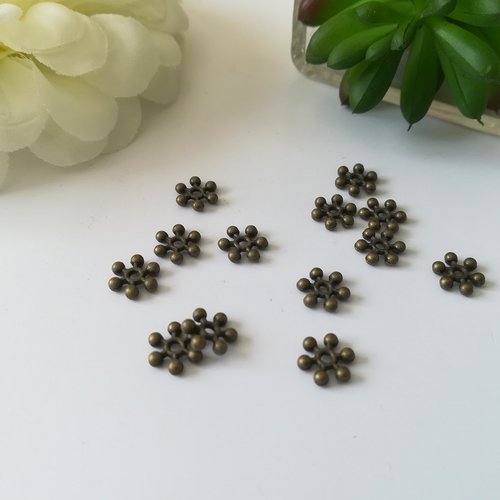 Perles métal flocon de neige 8.5 mm bronze x 20