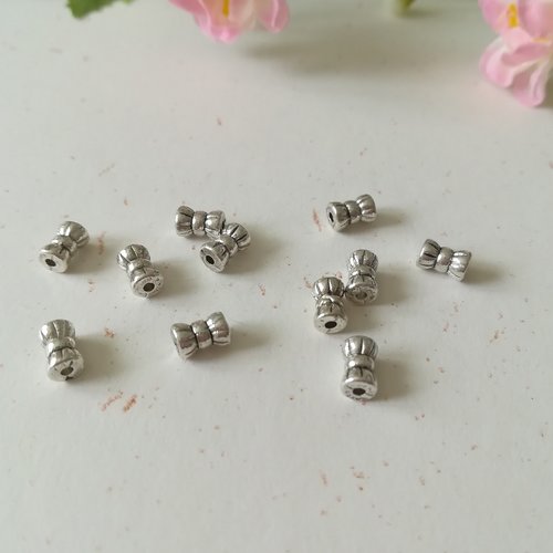 50 perles métal intercalaire 6 mm nœud papillon argent mat