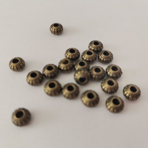 21 perles métal toupie 6 mm bronze