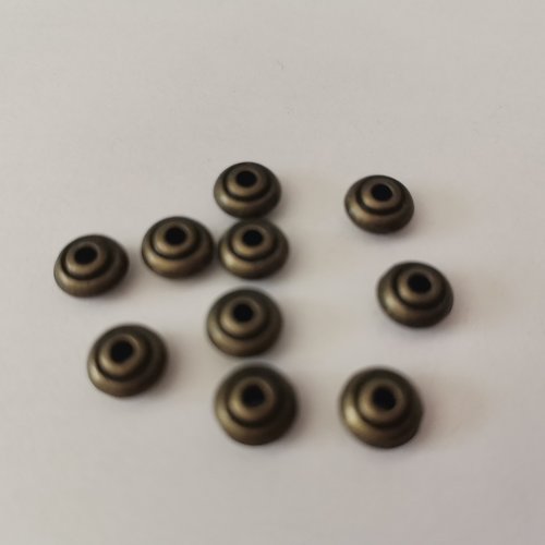 25 perles métal toupie 6.5 mm bronze