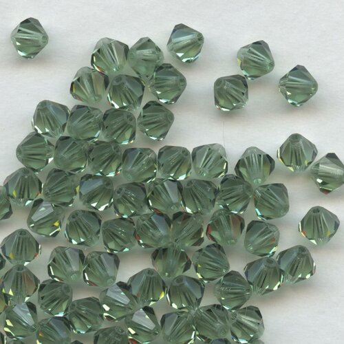 T6 5301 TY *** 15 toupies Swarovski 6mm TOPAZ SATIN