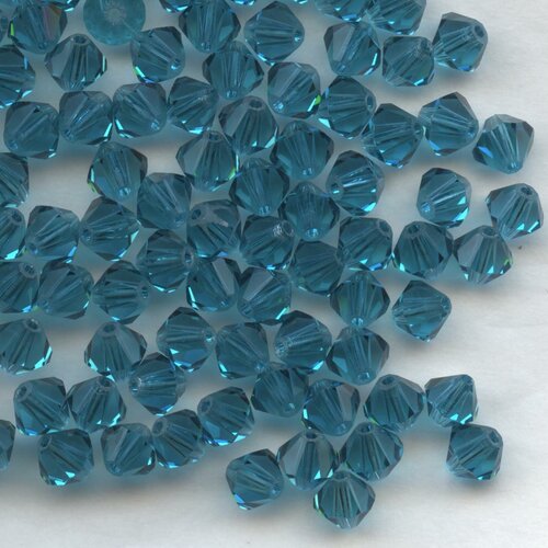 T5 5301 P *** 20 toupies cristal Swarovski 5mm PERIDOT