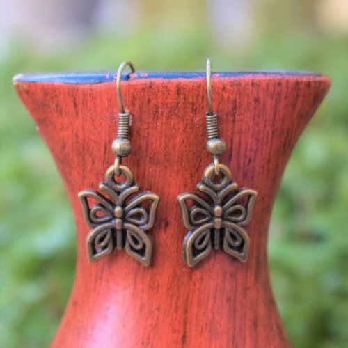 Boucles d'oreilles breloque papillon en métal bronze 13x32mm