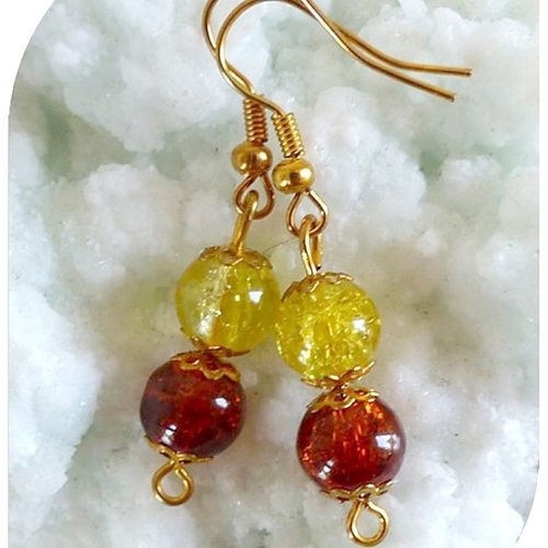 Boucles d'oreilles perles de verre orange et jaunes . crochets dorés.