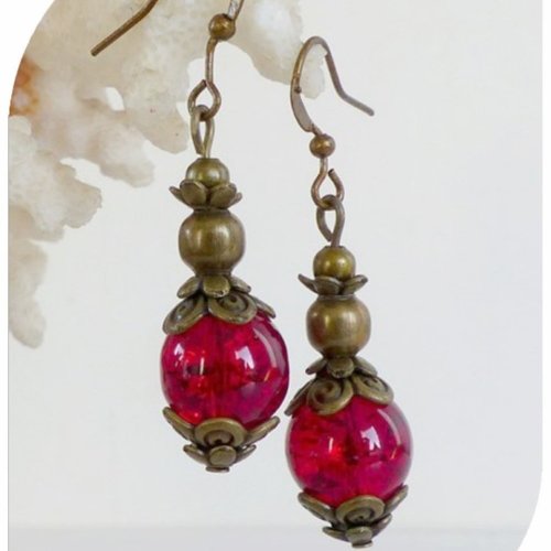 Boucles d'oreilles perles de verre rouges et bronze.