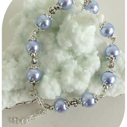 Bracelet perles de verre nacrées lavande . fermoir mousqueton .