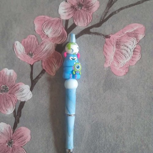 Stylo encre noire personnage monstres & cie