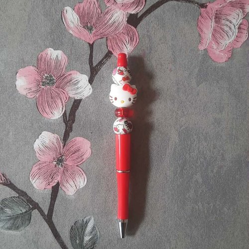 Stylo encre noire avec perles et hello kitty
