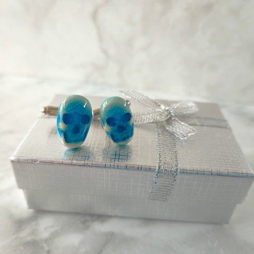 Boutons de manchette tête de mort bleu