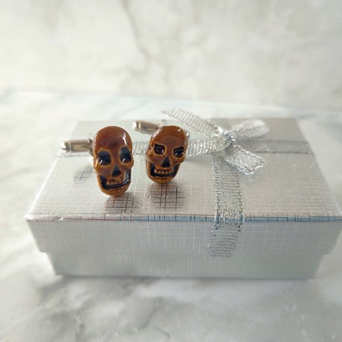 Boutons de manchette tête de mort marron