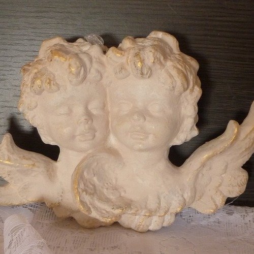 Deux visages d'anges à suspendre ou poser sur un meuble