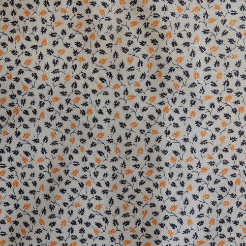 Coupon de tissu coton  fond blanc motif feuilles bleu marine et orange