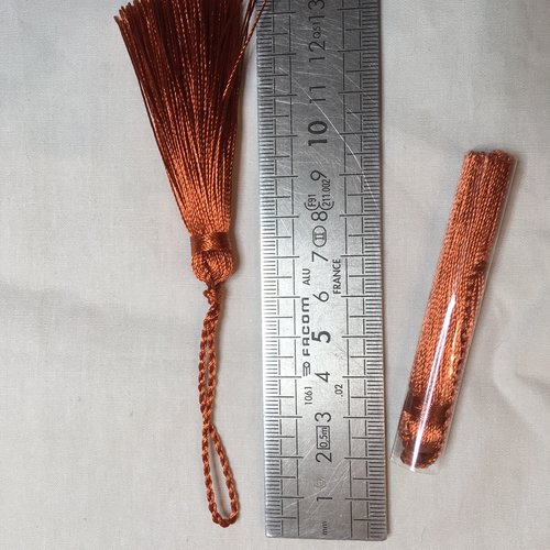 Pompon à fil rayonne longueur 7 cm couleur orange cuivré