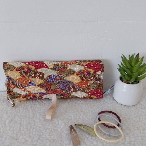 Pochette à barrettes
