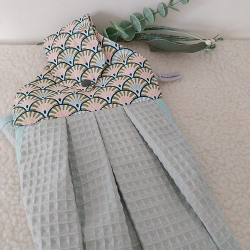 Essuie mains, accroche torchon