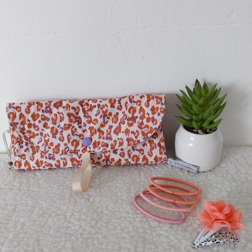 Pochette à barrettes