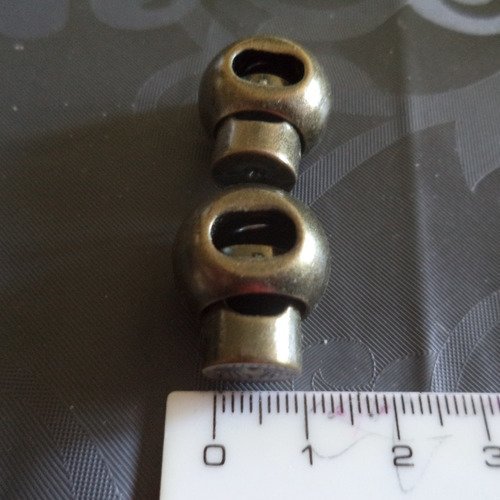 2 arrêts de cordon couleur bronze en métal