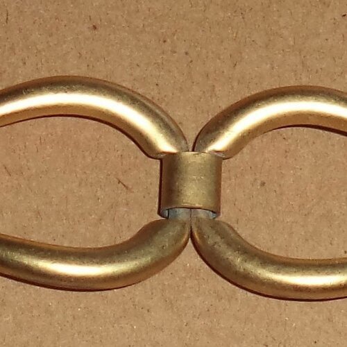 2 anneaux fantaisies entremelés de bonne qualité  couleur doré